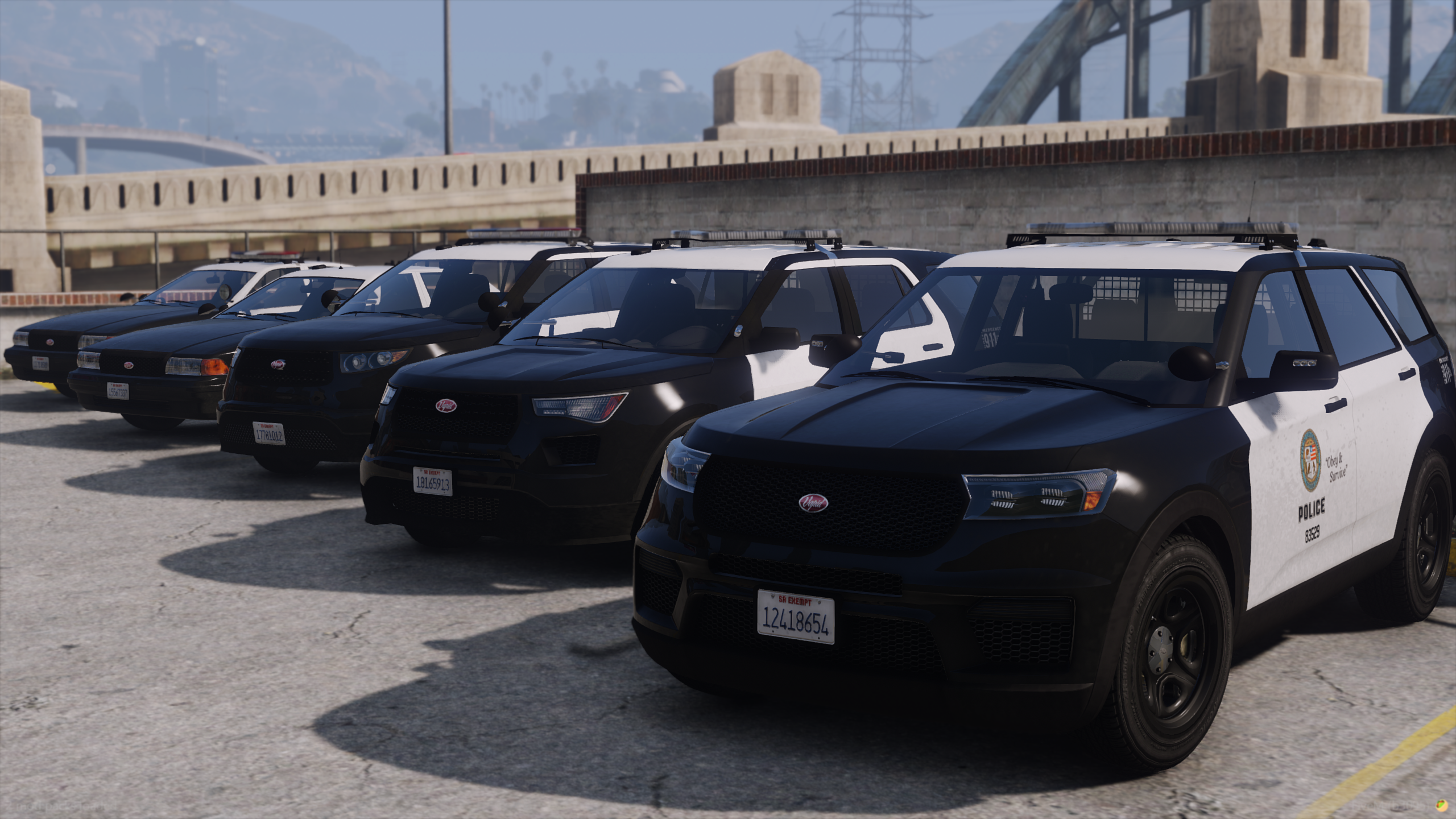 The Los Santos Police Department showcases their fleet of Vapid Scouts and Vapid Staniers.